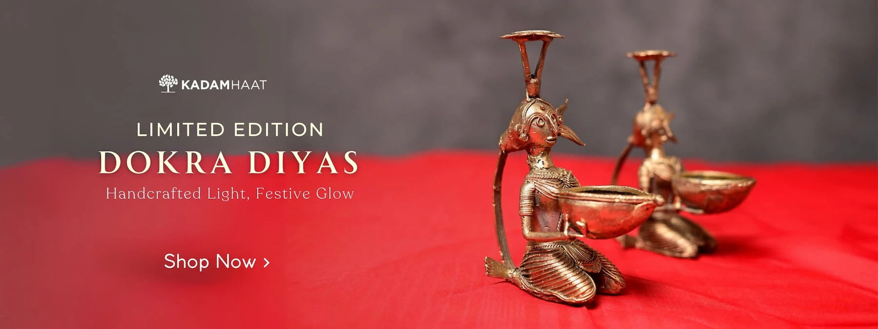 Kadam Haat Dokra Diyas on a red surface with a gray background